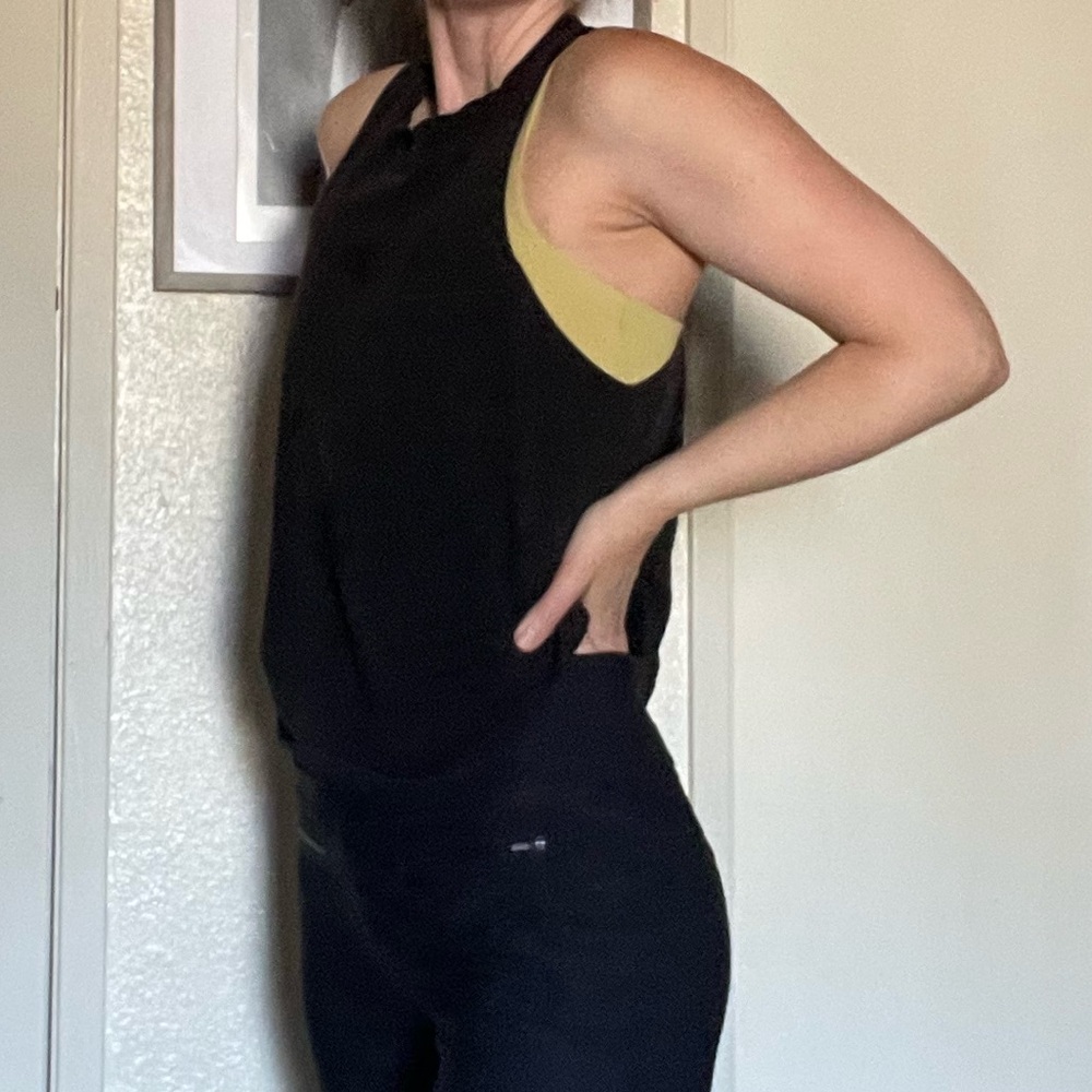 Forever 21 Black Sleeveless Muscle Tee tank
Top with front pocket  Sz m